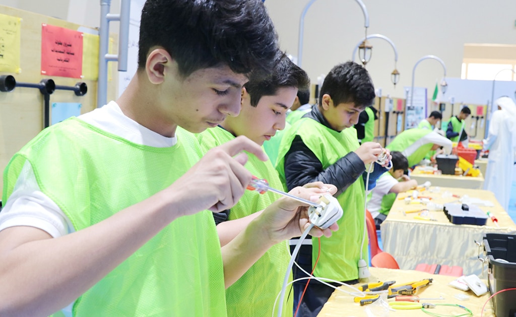 KUWAIT: Middle school students take on multiple electricity wiring challenges as part of the competition. 