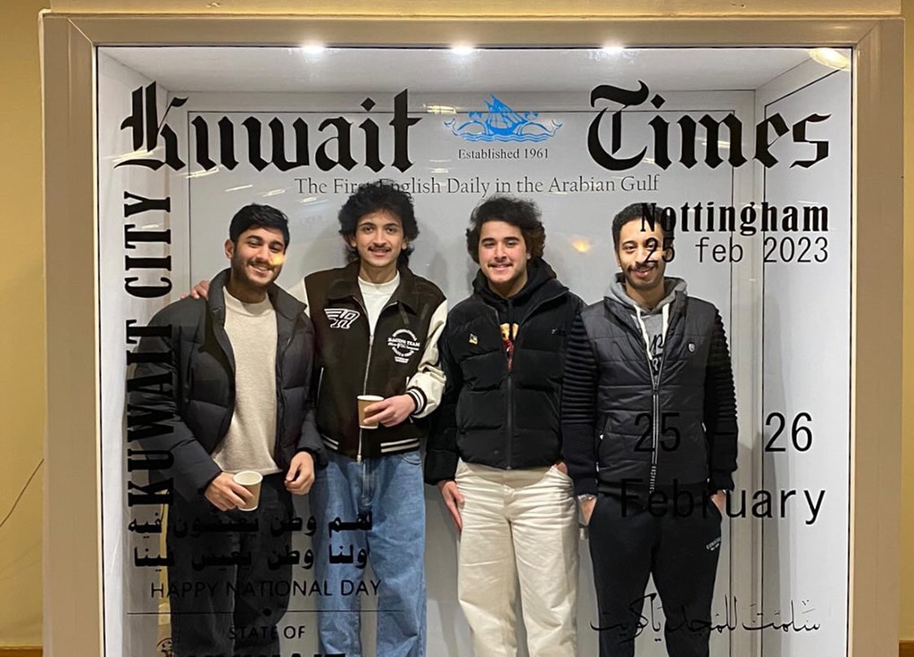 KUWAIT: UK-based students take a photo at the Kuwait Times booth at an event they held to celebrate National Day last month.
