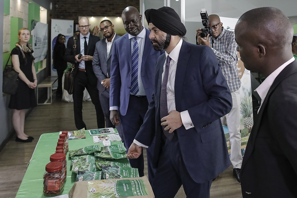NAIROBI: US candidate to head the World Bank, Ajay Banga (second right), visits a stand of food preservation by dehydration at the Kenya Climate Innovation Center (KCIC) at the Strathmore University Business School in Kenya in Nairobi on March 8, 2023. - AFP