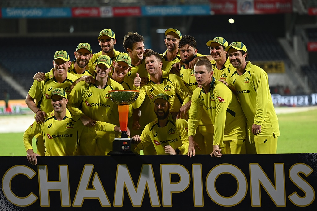 CHENNAI: Australia’s players celebrate after winning the third one-day international (ODI) cricket matchnbetween India and Australia at the M A Chidambaram Stadium on March 22, 2023. — AFP
