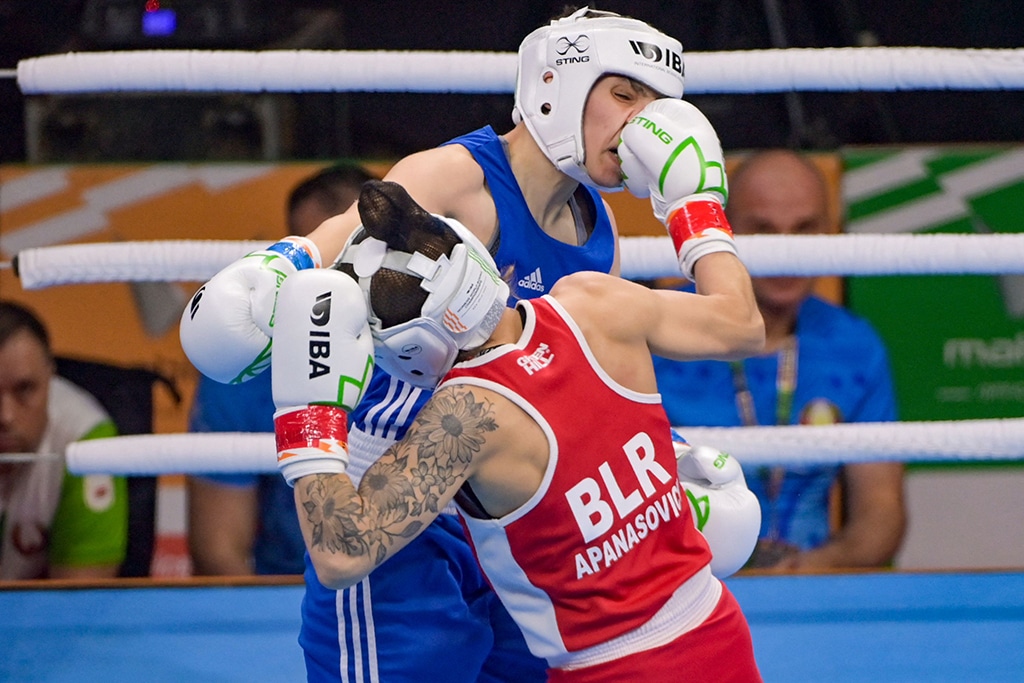 NEW DELHI: Belarus boxer Yulia Apanasovich (right) in action against Alexandra Anamaria Gheorghe of Romania during the preliminary round of the Elite women 50-52 kgs light fly IBA Women's World Boxing Championship 2023 on March 16, 2023. - AFP