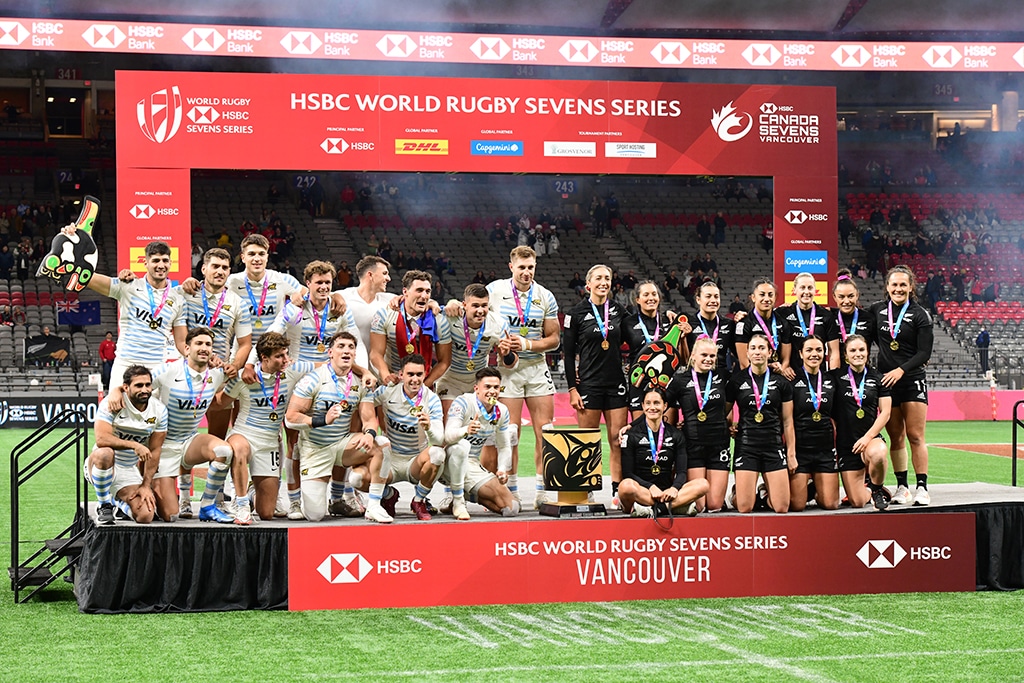 VANCOUVER: Men's Gold medalists Argentina's players (left) and Women's Gold medalists New Zealand's players pose on the podium during the annual HSBC Canada Rugby Sevens tournament at BC Place in Vancouver, Canada, on March 5, 2023. - AFP
