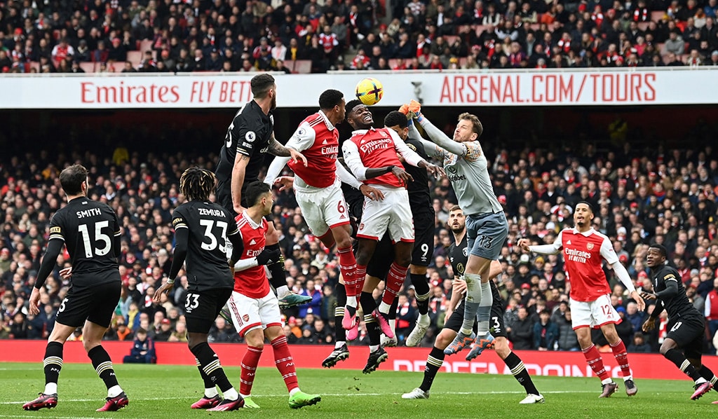 LONDON: Arsenal's Ghanaian midfielder Thomas Partey (center) heads the ball during the English Premier League football match between Arsenal and Bournemouth on March 4, 2023. - AFP