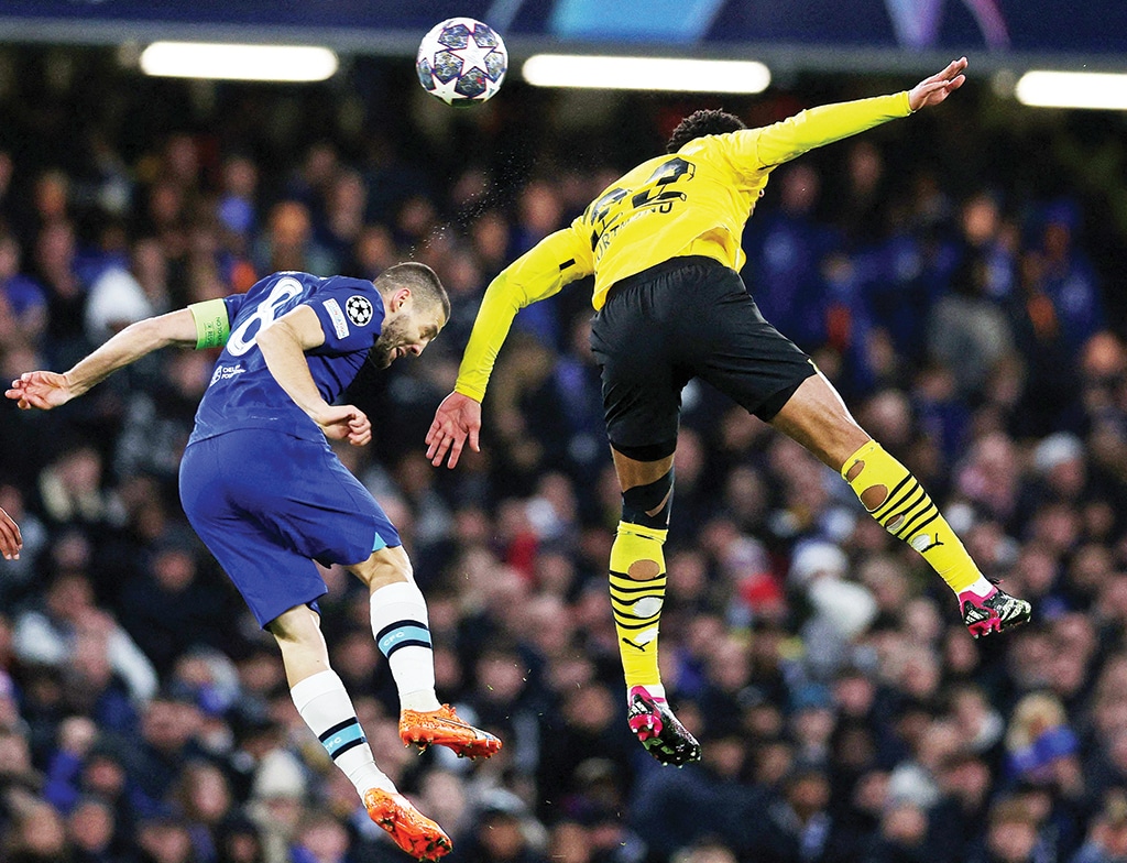 LONDON: Chelsea’s Croatian midfielder Mateo Kovacic (left) and Dortmund’s English midfielder Jude Bellingham vie to header the ball during the UEFA Champions League round of 16 second-leg football match between Chelsea and Borrusia Dortmund at Stamford Bridge in London on March 7, 2023. – AFP