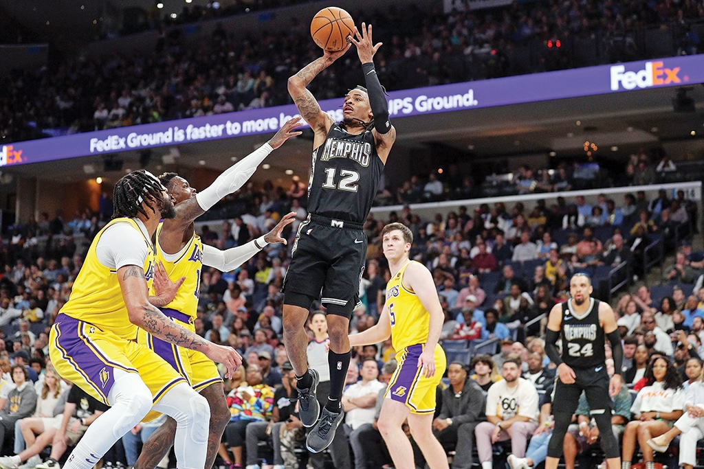 MEMPHIS: Ja Morant #12 of the Memphis Grizzlies takes a shot during the first half against the Los Angeles Lakers at FedExForum on February 28, 2023. - AFP