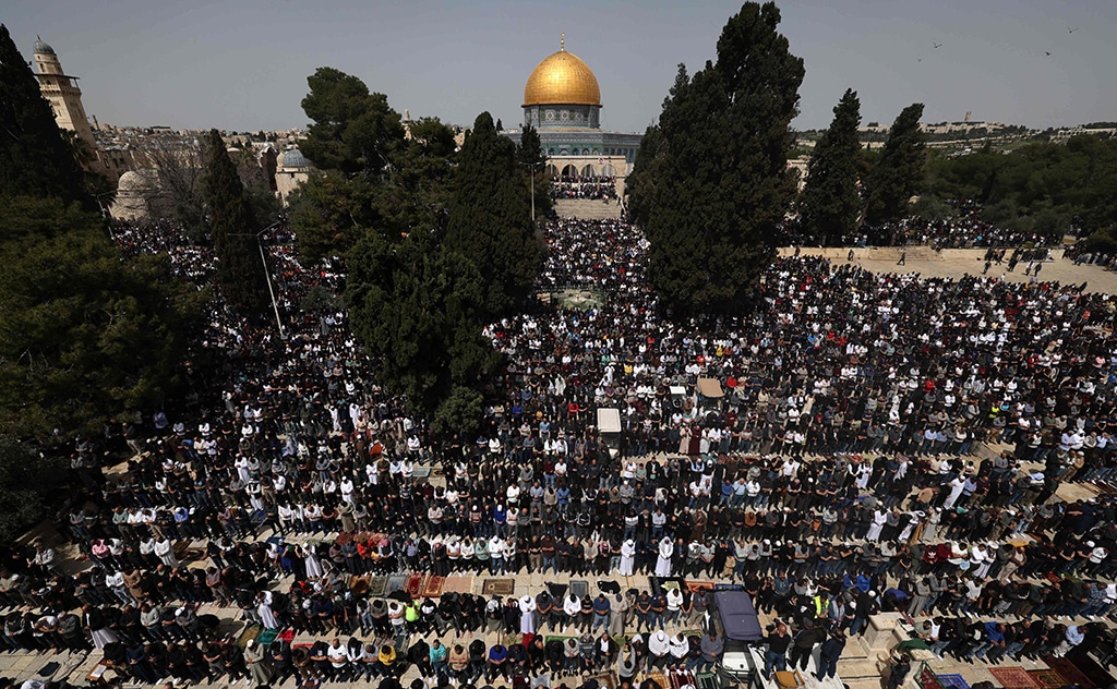 JERUSALEM: Worshippers perform the first Friday prayers of the fasting month of Ramadan in front of the Dome of the Rock at the Al-Aqsa Mosque compound on March 24, 2023. – AFP