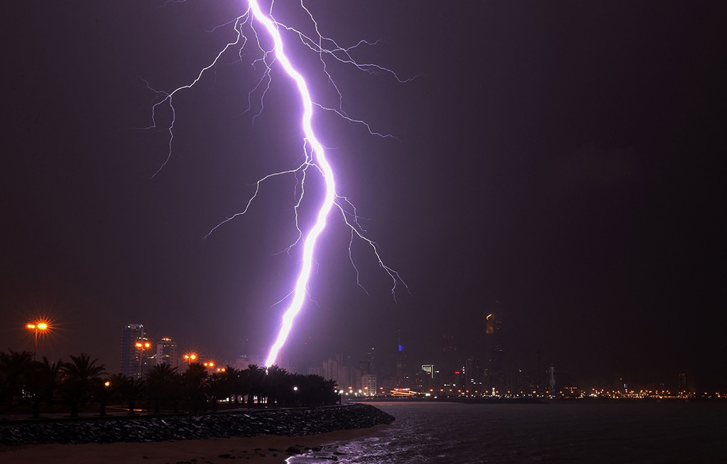 KUWAIT: Lightning flashes over Kuwait City during a thunderstorm on March 26, 2023.