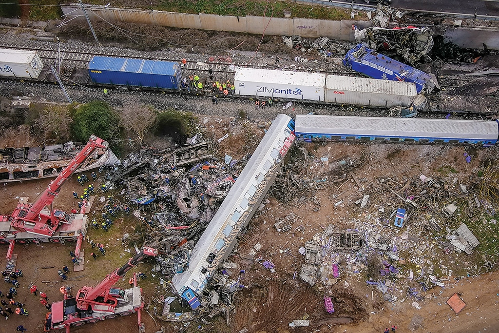 LARISSA, Greece: Aerial photo taken on March 1, 2023 shows emergency crews searching the wreckage after a train accident in the Tempi Valley. - AFP