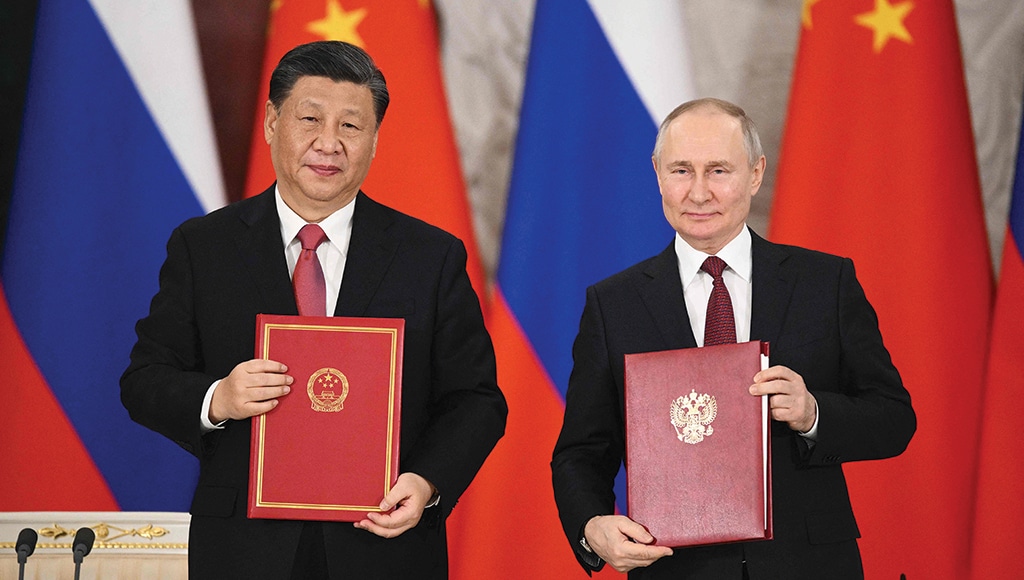 MOSCOW: Russian President Vladimir Putin and China's President Xi Jinping attend a signing ceremony following their talks at the Kremlin on March 21, 2023. – AFP