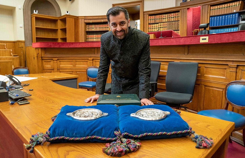 EDINBURGH: Leader of the SNP Humza Yousaf poses with the Great Seal of Scotland after being sworn in as First Minister at the Court of Session on March 29, 2023. - AFP