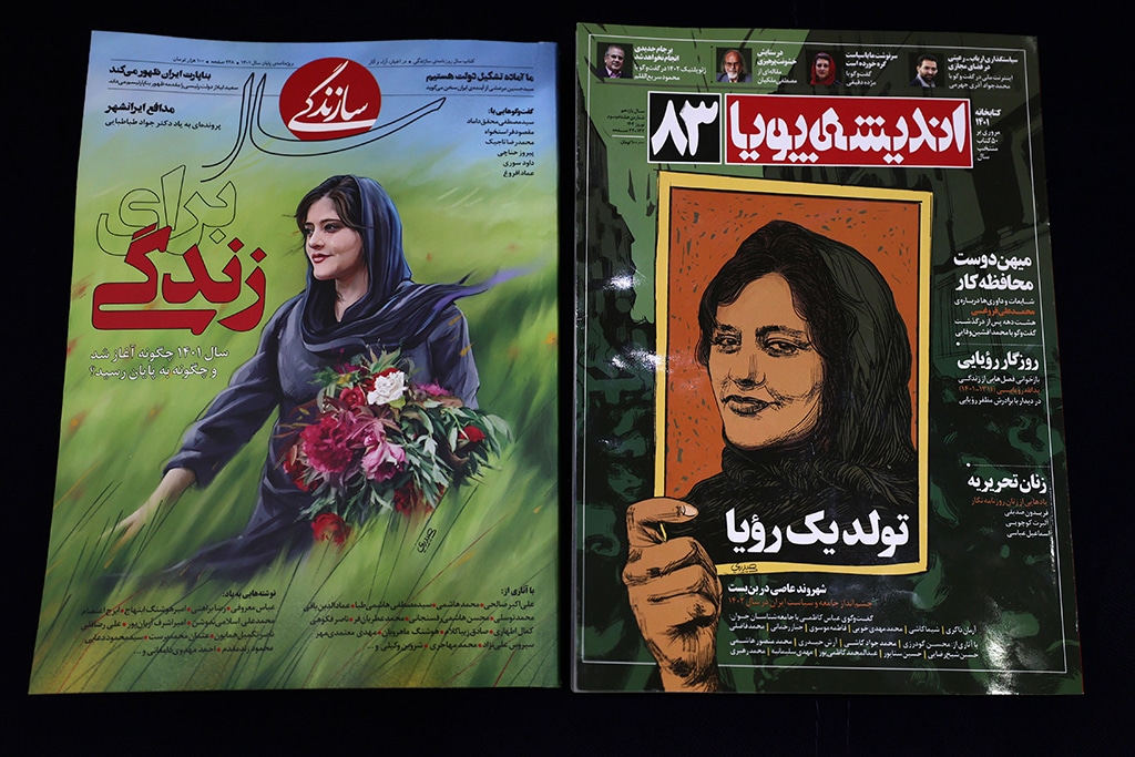 TEHRAN: A picture shows Iranian magazines Sazandegi (left) and Andisheh reporting on the death of Mahsa Amini on March 14, 2023. - AFP