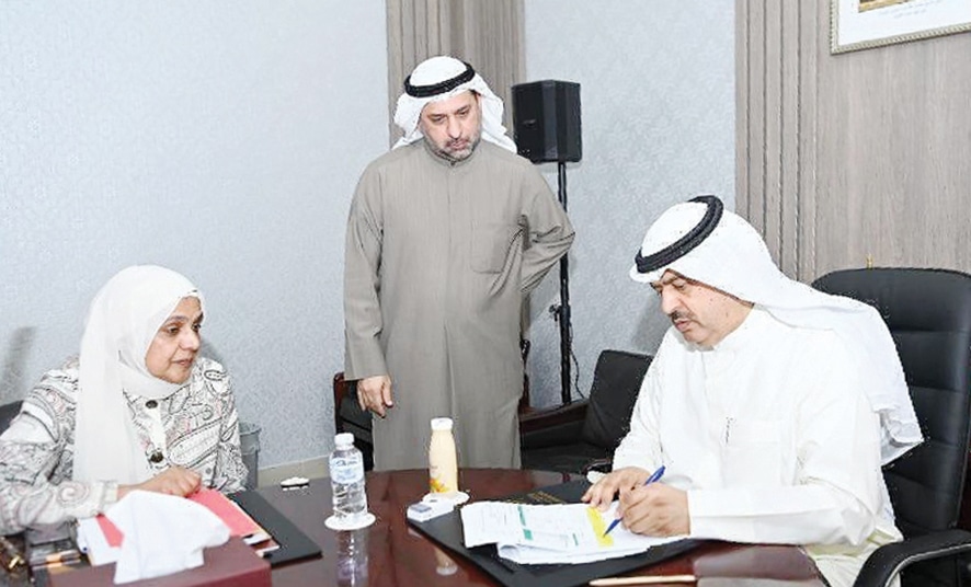 KUWAIT: Hawalli Governor Ali Al-Asfar signs to register governorate as integrated healthy city.- KUNA