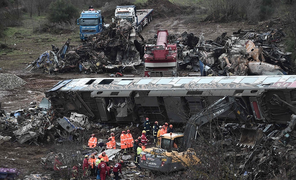 LARISSA: Police and emergency crews examine the debris of a crushed wagon on the second day after a train accident in the Tempi Valley near Larissa, Greece, March 2, 2023. - AFP