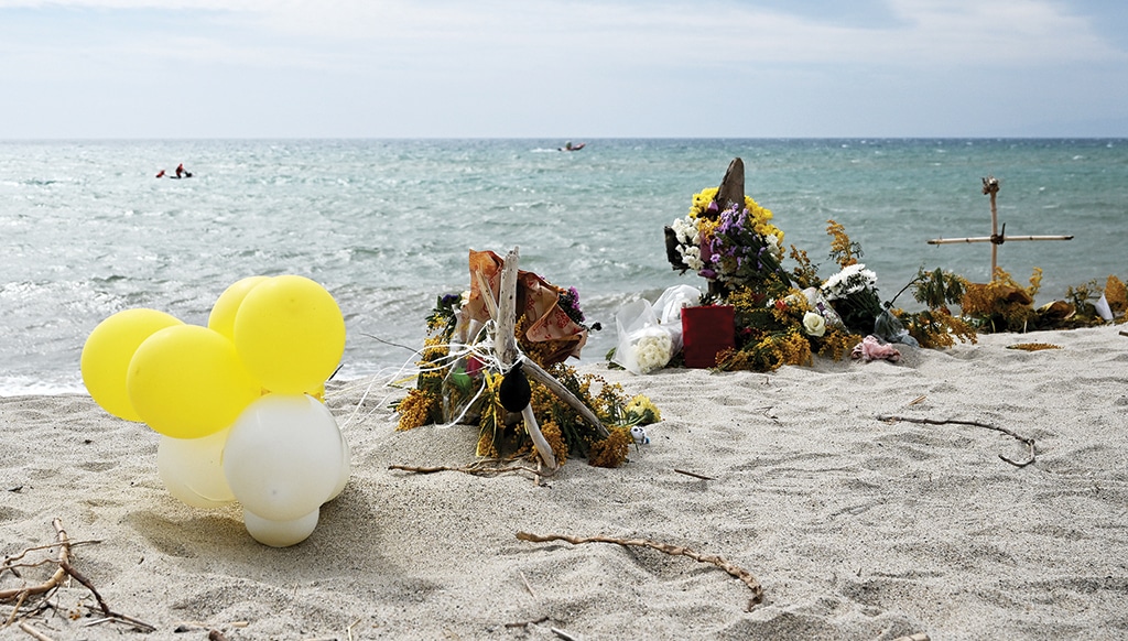 CUTRO: Photograph shows a view of a memorial with flowers, crosses and balloons on a beach near Cutro, with the Mediterranean Sea in the background, where at least 72 migrants died on February 26, after their boat sank off Italy's southern Calabria region. – AFP