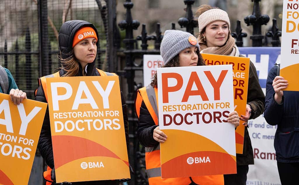 LONDON: Junior doctors and supporters join the picket line outside St Thomas' Hospital as members of the British Medical Association take part in a 72-hour strike action over pay in London, United Kingdom on March 13, 2023. - AFP