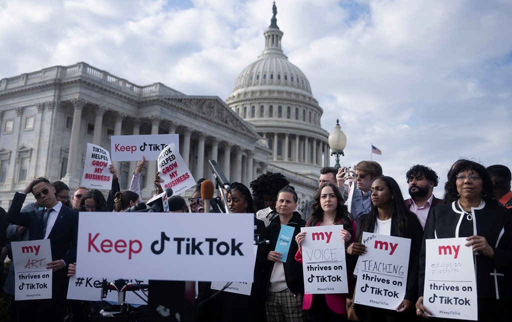 WASHINGTON: People gather for a press conference about their opposition to a TikTok ban on Capitol Hill in Washington, DC on March 22, 2023. – AFP
