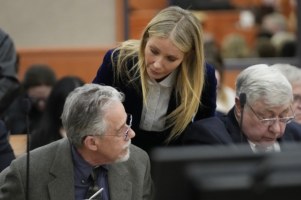 US actress Gwyneth Paltrow speaks with retired optometrist Terry Sanderson as she walks out of the courtroom following the reading of the verdict on March 30, 2023, in Park City, Utah.– AFP photos