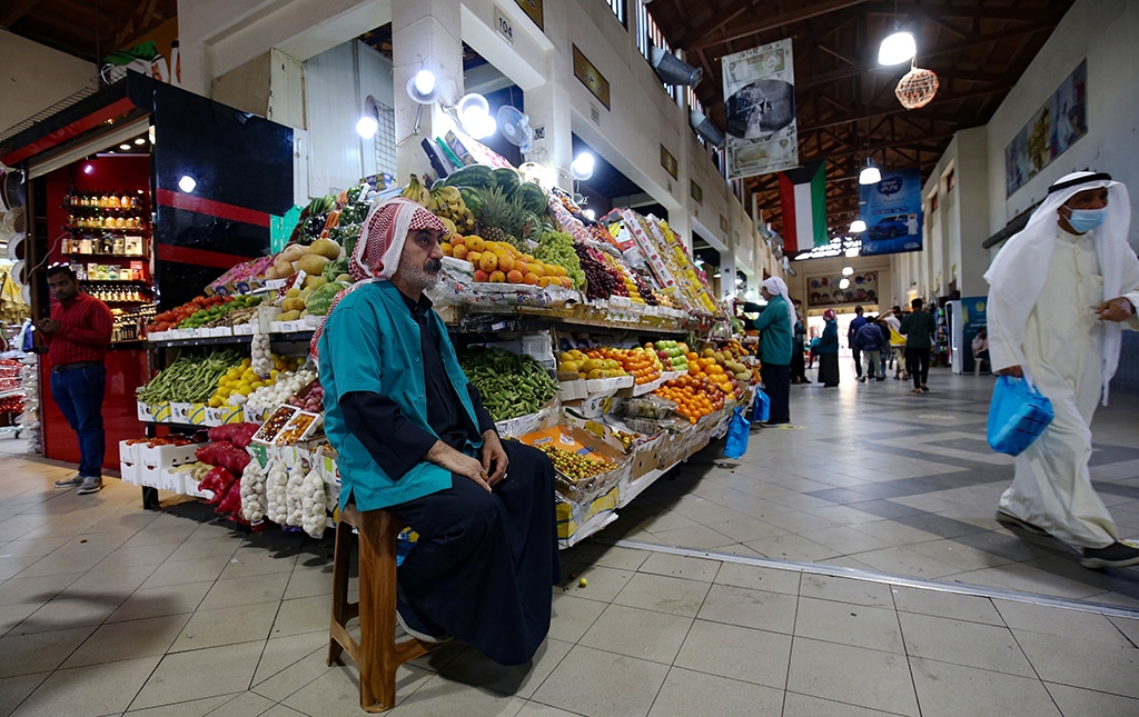 KUWAIT: A vendor waits for customers at a market during the first day of the holy month of Ramadan in downtown Kuwait City. - Photo by Yasser Al-Zayyat