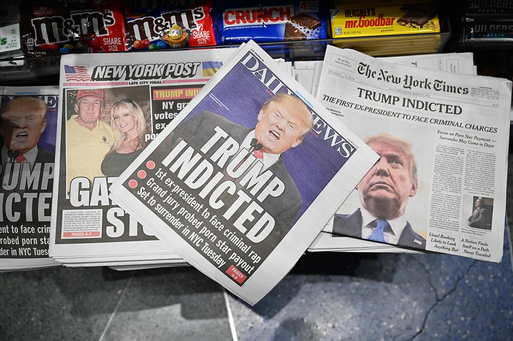 NEW YORK: Newspaper front pages with former US President Donald Trump are displayed at a newsstand on March 31, 2023. – AFP