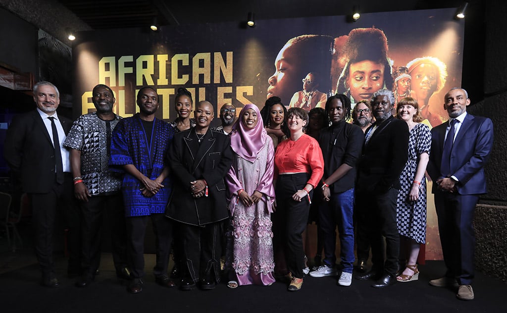 UNESCO Assistant Director General Ernesto Ottone (left), Tanzanian filmmaker Walt Mzengi (3rd left), South African filmmaker Gcobisa Yako (5th left), Nigerian filmmaker Korede Azeez (7th left), Kenyan filmmaker Voline Ogutu (8th left), and Ugandan filmmaker Loukman Ali (11th left), Netflix Director of Local language Films Africa Tendeka Matatu (right) and guests pose for a photocall at a films premiere where five winning filmmakers are showcased in a competition entitled ‘African Folktales, Reimagined’ to find some of Sub-Saharan Africa’s up and coming filmmakers, in the Kenyan capital, Nairobi, on March 29, 2023. — AFP