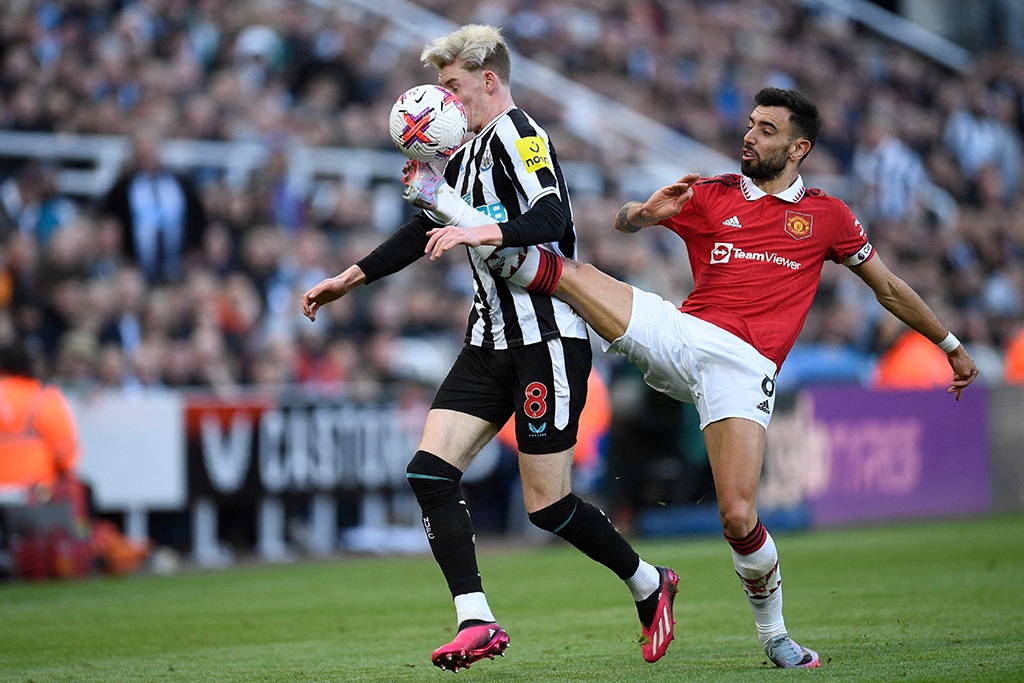 NEWCASTLE: Newcastle United’s English midfielder Anthony Gordon (left) vies with Manchester United’s Portuguese midfielder Bruno Fernandes (right) during the English Premier League football match on April 2, 2023. — AFP