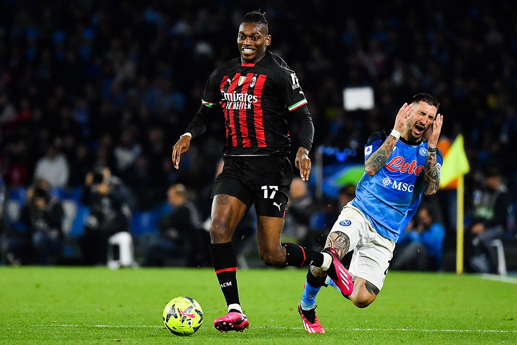 NAPLES: Napoli’s Italian forward Matteo Politano (right) reacts after colliding with AC Milan’s Portuguese for-nward Rafael Leao during the Italian Serie A football match between on April 2, 2023.— AFP