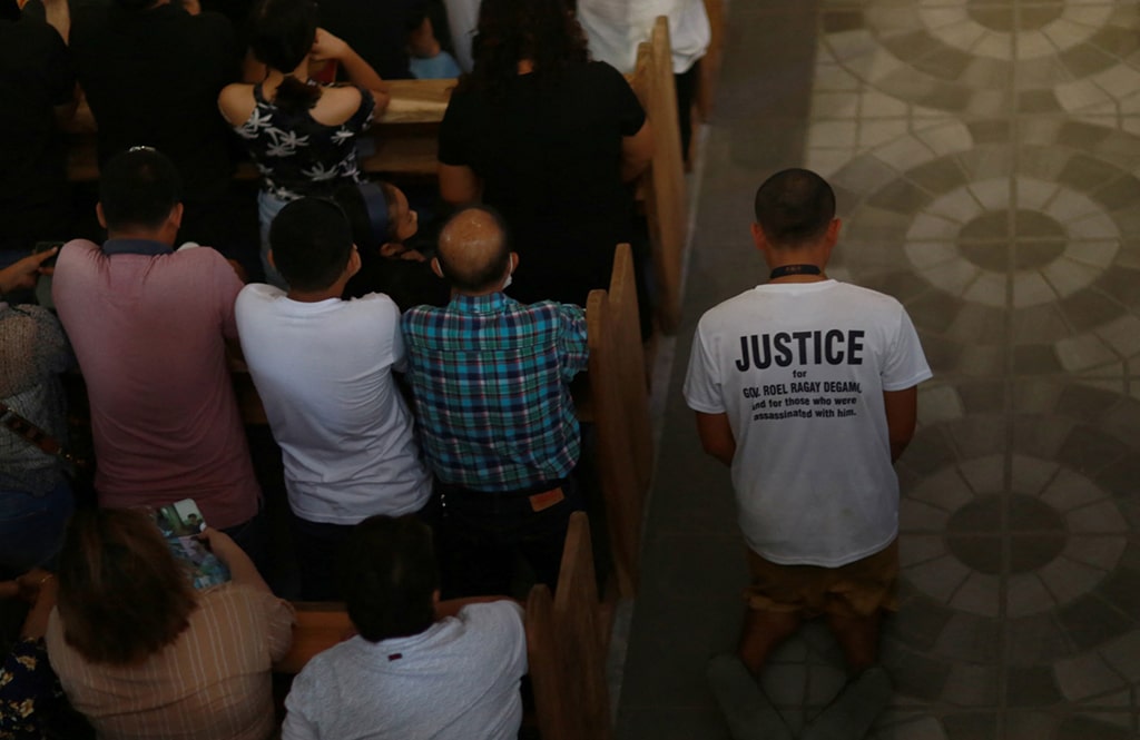 SIATON: File photo shows supporters attending the funeral procession of Roel Degamo, governor of Negros Oriental province, in Siaton, Negros Oriental. Three people have been arrested over the murder of a Philippine provincial governor and eight others. – AFP