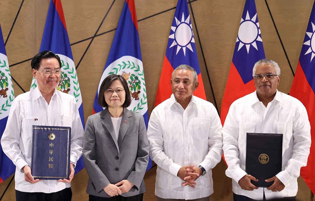 BELMOPAN: Handout picture shows (L-R) Taiwan’s Foreign Minister Jaushieh Joseph Wu, Taiwan’s President Tsai Ing-wen, Belize’s Prime Minister John Briceño and Belize’s Minister of Foreign Affairs, Foreign Trade, and Immigration, Eamon Courtenay pose for a picture after the signing ceremony of a Technical Cooperation Framework Agreement and the handing over of digital devices at the Foreign Ministry in Belmopan. — AFP