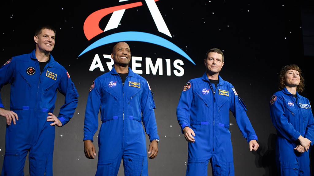 HOUSTON: (From left) Astronauts Jeremy Hansen, Victor Glover, Reid Wiseman and Christina Hammock Koch stand onstage during a news conference at Ellington airport on April 3, 2023. – AFP