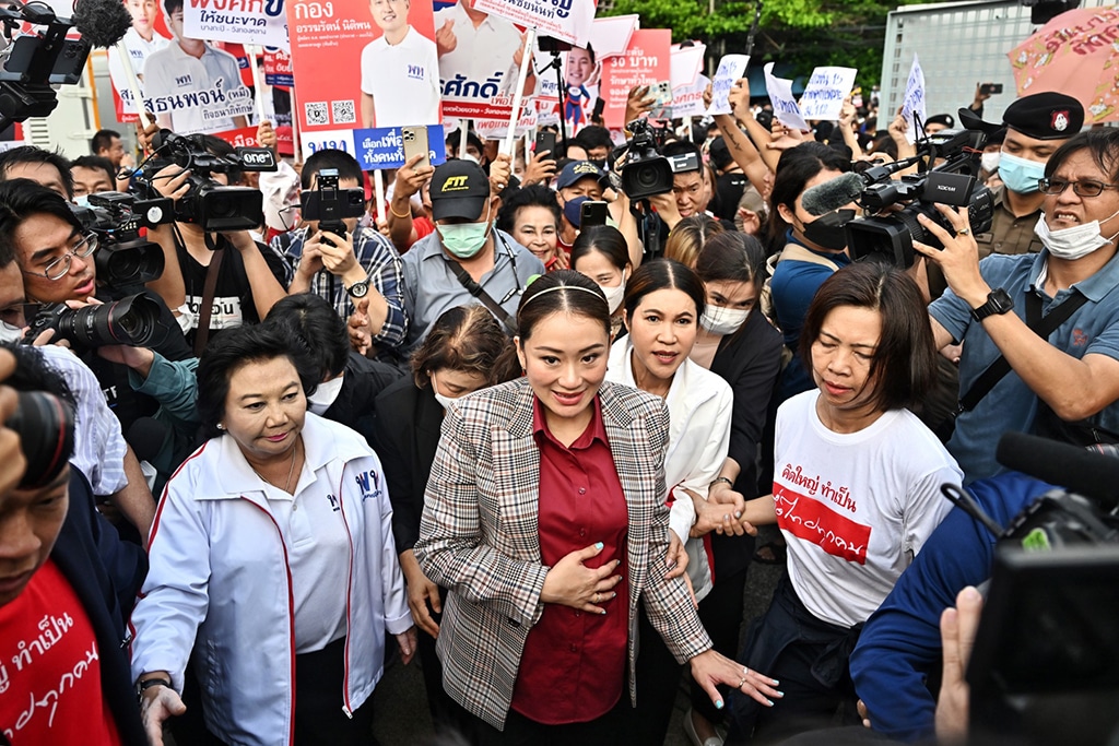 BANGKOK: Pheu Thai Party candidate Paethongtarn Shinawatra arrives for the first day of the constituencies candidates registration for the upcoming general election, in Bangkok. – AFP