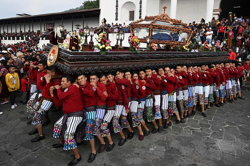 Catholic devotees take part in a Holy Burial procession during Good Friday in Santiago Atitlan, Guatemala. - AFP photos