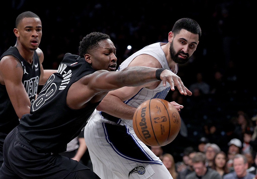 NEW YORK: Dorian Finney-Smith #28 of the Brooklyn Nets and Goda Bitadze #35 of the Orlando Magic at Barclays Center in the Brooklyn borough of New York City. — AFP