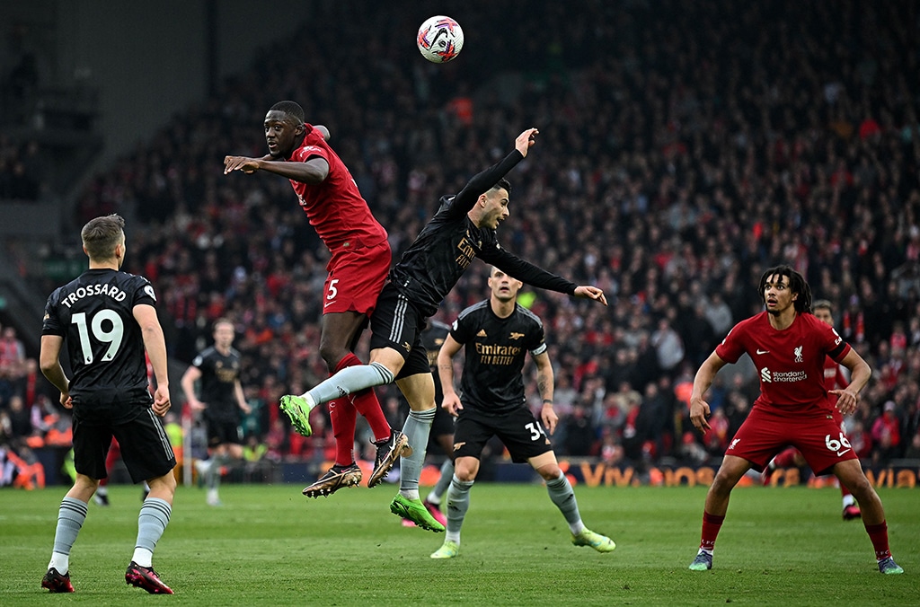 LIVERPOOL: Liverpool’s French defender Ibrahima Konate (2nd left) and Arsenal’s Brazilian midfielder Gabriel Martinelli vie in the air for the ball during the English Premier League football match between Liverpool and Arsenal on April 9, 2023. – AFP