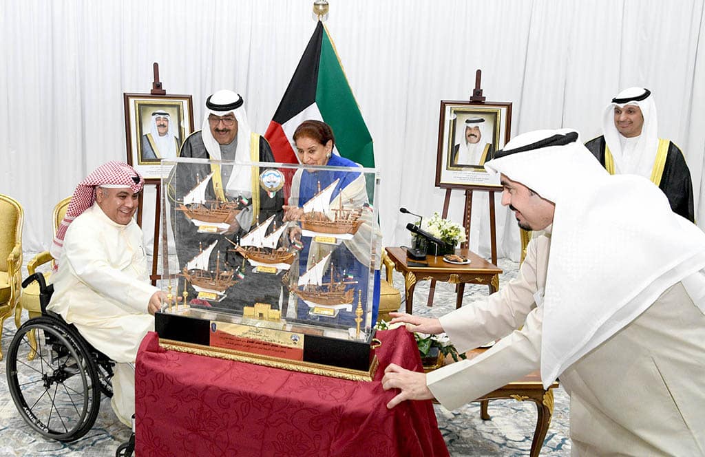 HH the Crown Prince Sheikh Mishal Al-Ahmad Al-Jaber Al-Sabah receives a souvenir during his visit.
