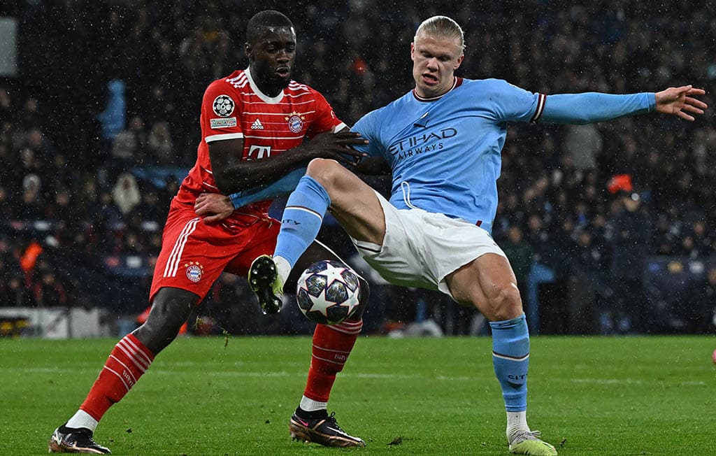 MANCHESTER: Bayern Munich's French defender Dayot Upamecano vies with Manchester City's Norwegian striker Erling Haaland at the Etihad Stadium on April 11, 2023. – AFP