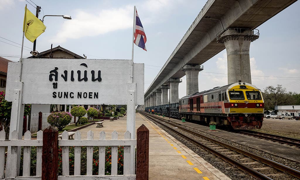 SUNG NOEN, Thailand: In this photo taken on March 29, 2023 a train sits below an elevated track, still under construction as part of the Thai-Chinese Bangkok-Nong Khai high-speed railway project at Sung Noen Station in Nakhon Ratchasima province. -- AFP
