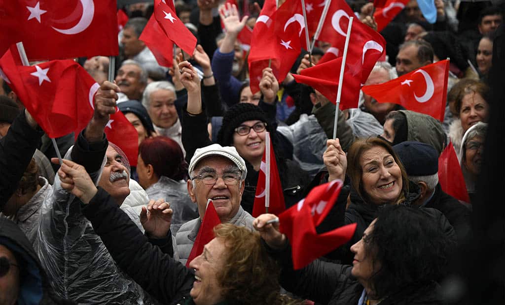 CANAKKALE: Supporters wave Turkish national flags as they attend a rally of Turkey's Republican People's Party (CHP) Chairman and Presidential candidate Kemal Kilicdaroglu in Canakkale, western Turkey. – AFP
