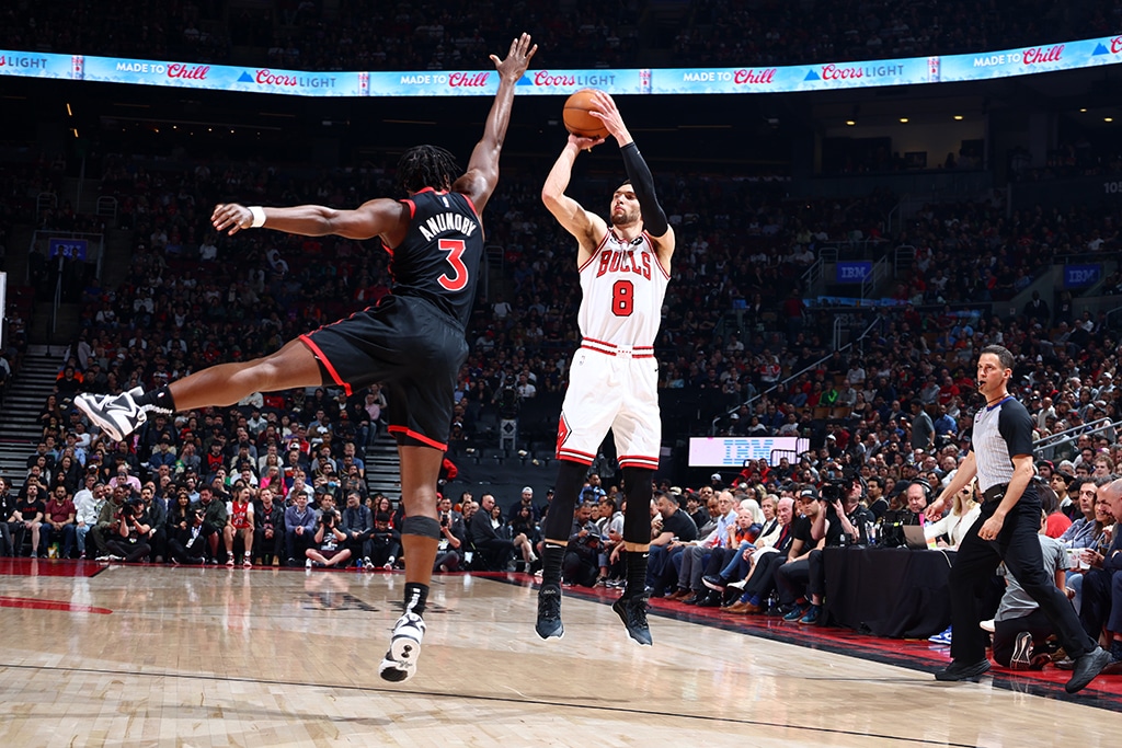 TORONTO: Zach LaVine of the Chicago Bulls shoots a three-point basket during the game against the Toronto Raptors during the 2023 Play-In Tournament on April 12, 2023 at the Scotiabank Arena. – AFP
