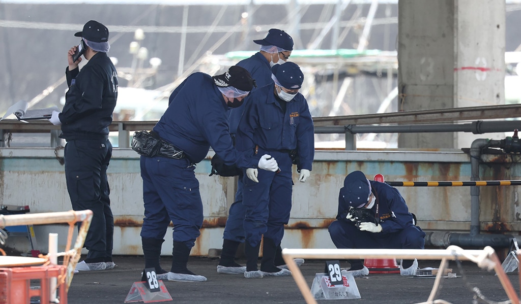WAKAYAMA: Police officers investigate Saikazaki port, where Japan's Prime Minister Fumio Kishida was evacuated unharmed from the scene of an apparent 'smoke bomb' blast a day before, in Wakayama on April 16, 2023. – AFP