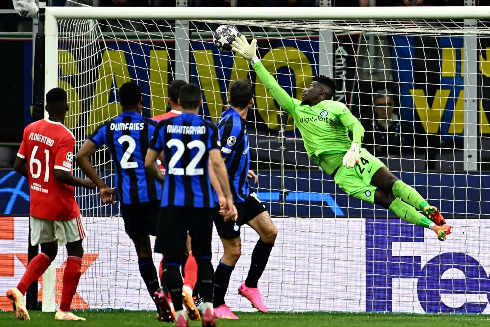 MILAN: Inter Milan's Cameroonian goalkeeper Andre Onana concedes his side's second goal during the UEFA Champions League quarter-finals second leg football match between Inter Milan and Benfica Lisbon on April 19, 2023 at the Giuseppe-Meazza (San Siro) stadium in Milan. - AFP