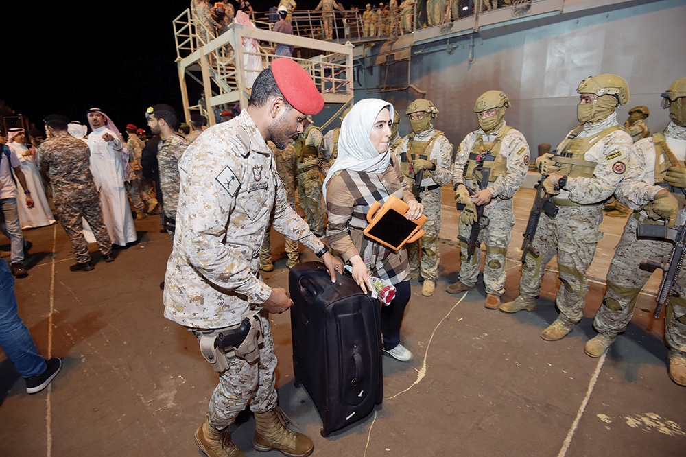 JEDDAH: Saudi citizens and other nationals arrive at King Faisal navy base following their rescue from Sudan.- AFP