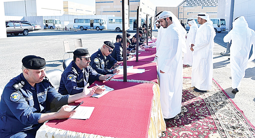 KUWAIT: Photos show participants during the exercise. Saad Al-Abdullah Academy for Security Sciences on Tuesday organized a selection exercise for applicants for specialized officers for university degree holders. — KUNA photos