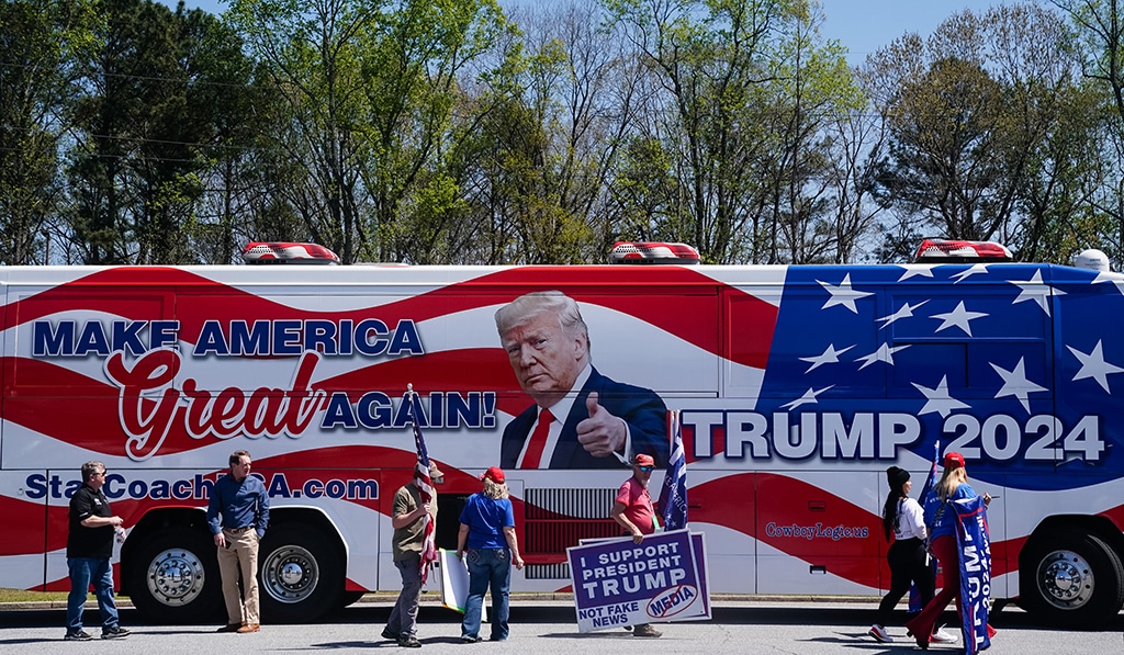 SMYRNA, US: Supporters of former US president Donald Trump are seen outside a stop on Florida Governor Ron DeSantis' nationwide book tour at Adventure Outdoors, the largest gun store in the country, in Smyrna, Georgia. -- AFP