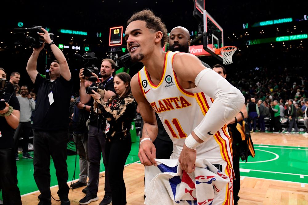 BOSTON: Trae Young of the Atlanta Hawks smiles after the game against the Boston Celtics during Round One Game Five of the 2023 NBA Playoffs on APRIL 25, 2023 at the TD Garden in Boston, Massachusetts. - AFP