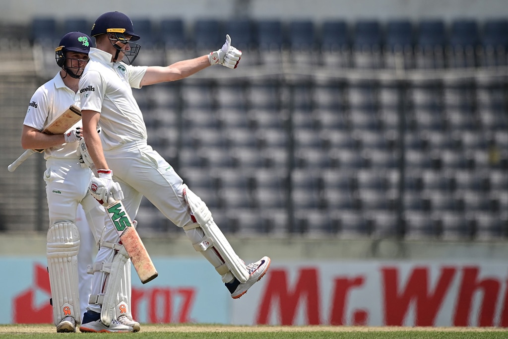 DHAKA: Ireland's Harry Tector celebrates after scoring a half-century (50 runs) during the third day of the Test cricket match between Bangladesh and Ireland at the Sher-e-Bangla National Cricket Stadium in Dhaka on April 6, 2023. – AFP