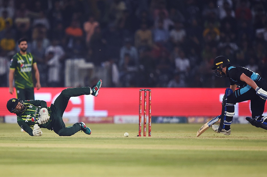 LAHORE: Pakistan's wicketkeeper Mohammad Rizwan attempts a stump New Zealand's Mark Chapman during their first Twenty20 match at the Gaddafi Cricket Stadium on April 14, 2023. – AFP
