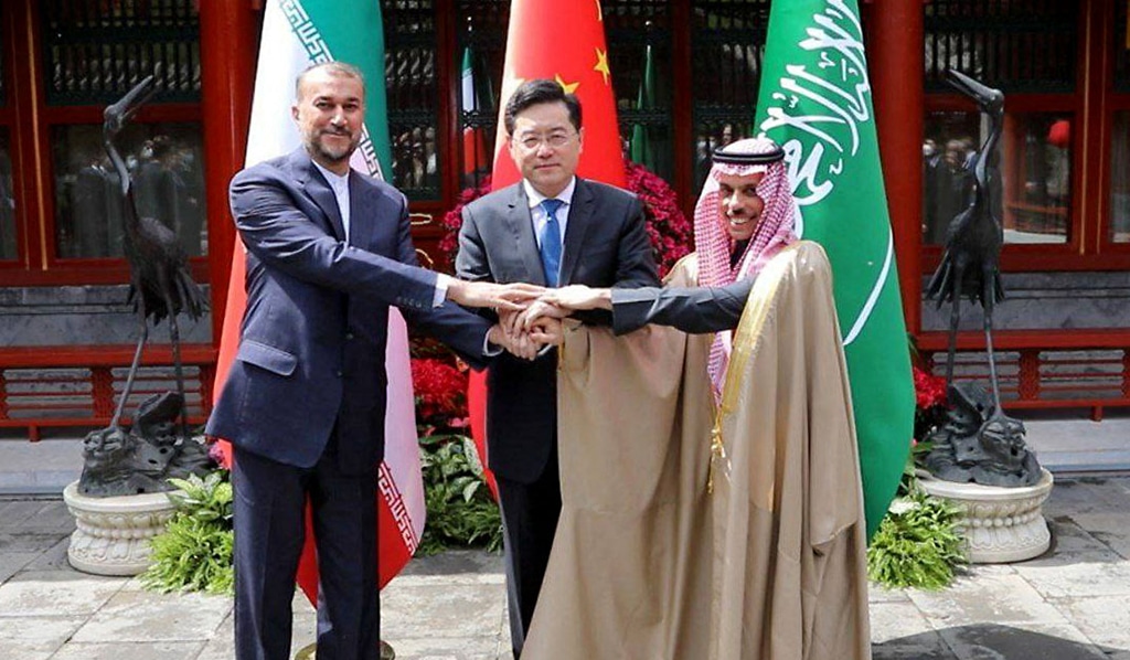 BEIJING: Iran’s Foreign Minister Hossein Amir-Abdollahian (left) shakes hands with Saudi Foreign Affairs Minister Prince Faisal bin Farhan and Chinese Foreign Minister Qin Gang (center) during a meeting in Beijing on April 6, 2023. — AFP