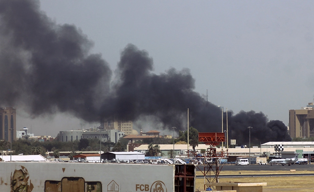 KHARTOUM: Heavy smoke bellows above buildings in the vicinity of the Khartoum's airport on April 15, 2023, amid clashes in the Sudanese capital. - AFP