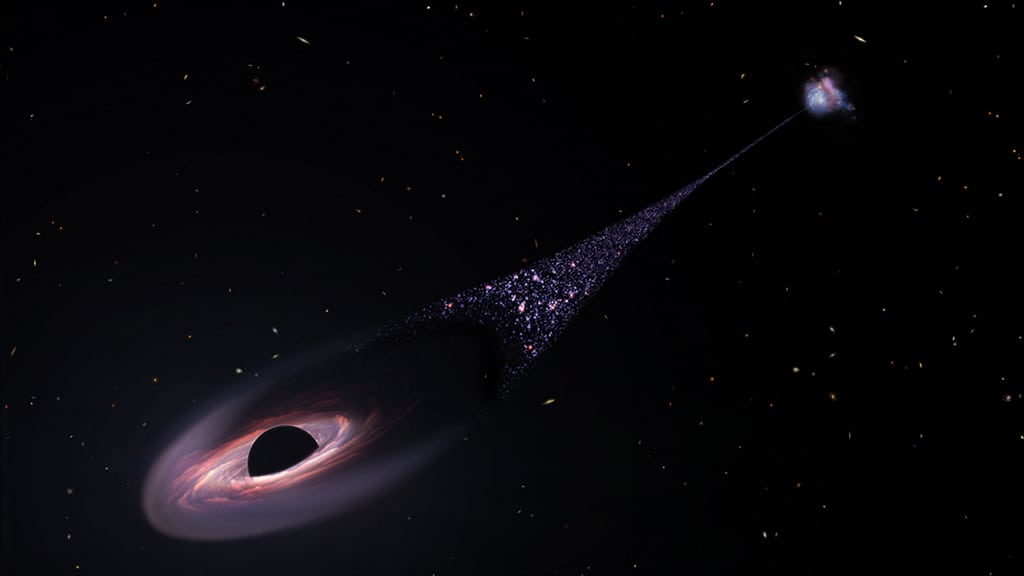 This artist's impression released by NASA on April 7, 2023 depicts a runaway supermassive black hole that was ejected from its host galaxy as a result of a tussle between it and two other black holes. – AFP