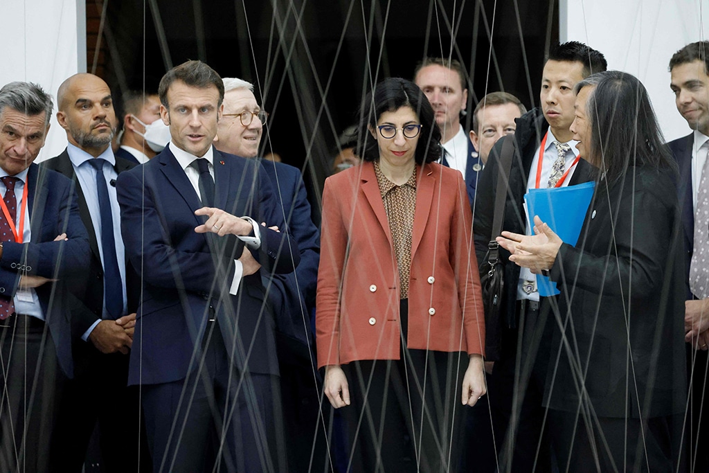 BEIJING: French President Emmanuel Macron (3rd-L) visits the Red Brick Museum in Beijing on April 5, 2023. – AFP
